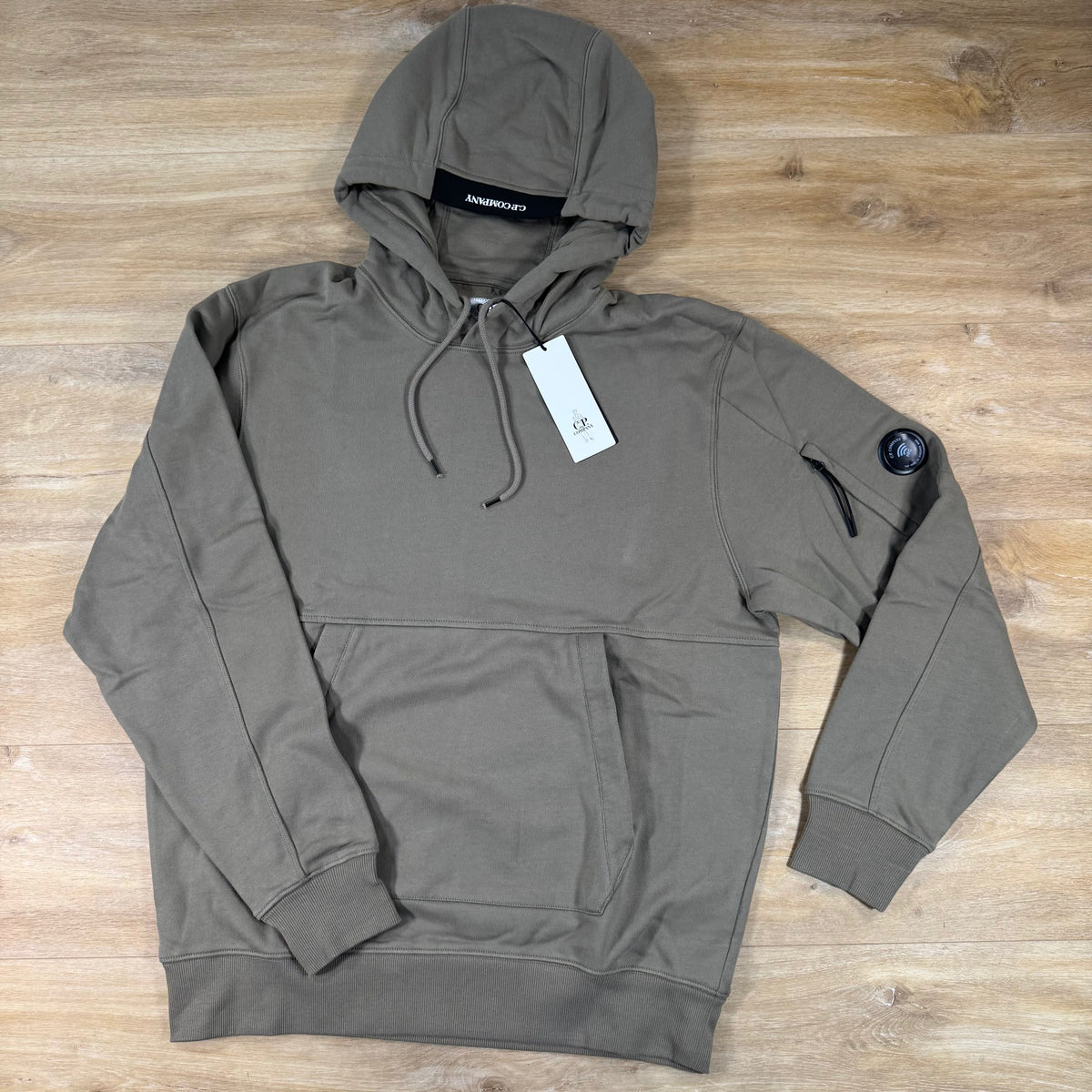 C.P. Company Diagonal Raised Fleece Lens Hoodie in Fallen Rock - Beige